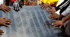 As Tulsa digs for victims of the 1921 race massacre, victims say the road to justice is a long one