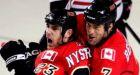 Flames too much for Blackhawks in Game 4