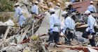 Japan death toll hits 9,079