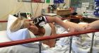 Woman whose breast implants exploded when a kangaroo knocked her off her bike